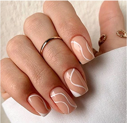 Uñas decoradas con curvas y diseños